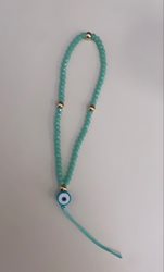 שרשרת לטלפון מחרוזי קריסטלים צבע ירוק עין ירוקה.